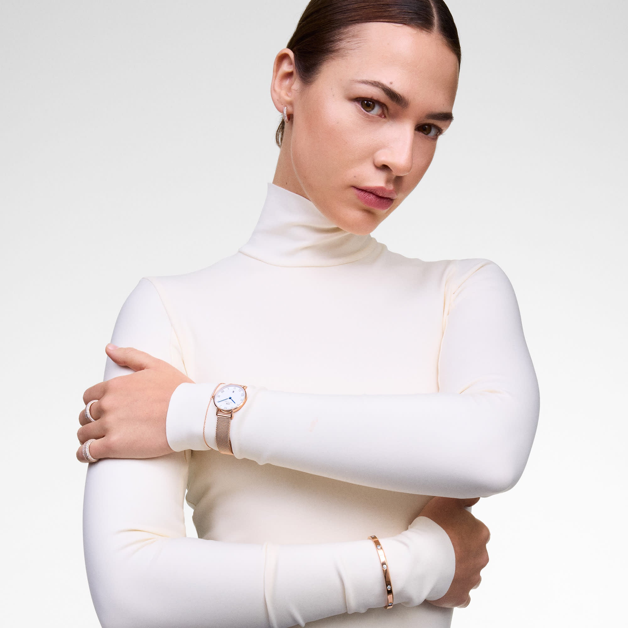 DW Petite Roman Numerals Date Rose Gold Watch